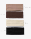 Four headbands in different colors arranged vertically on a white background.