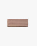 Beige headband on a white background