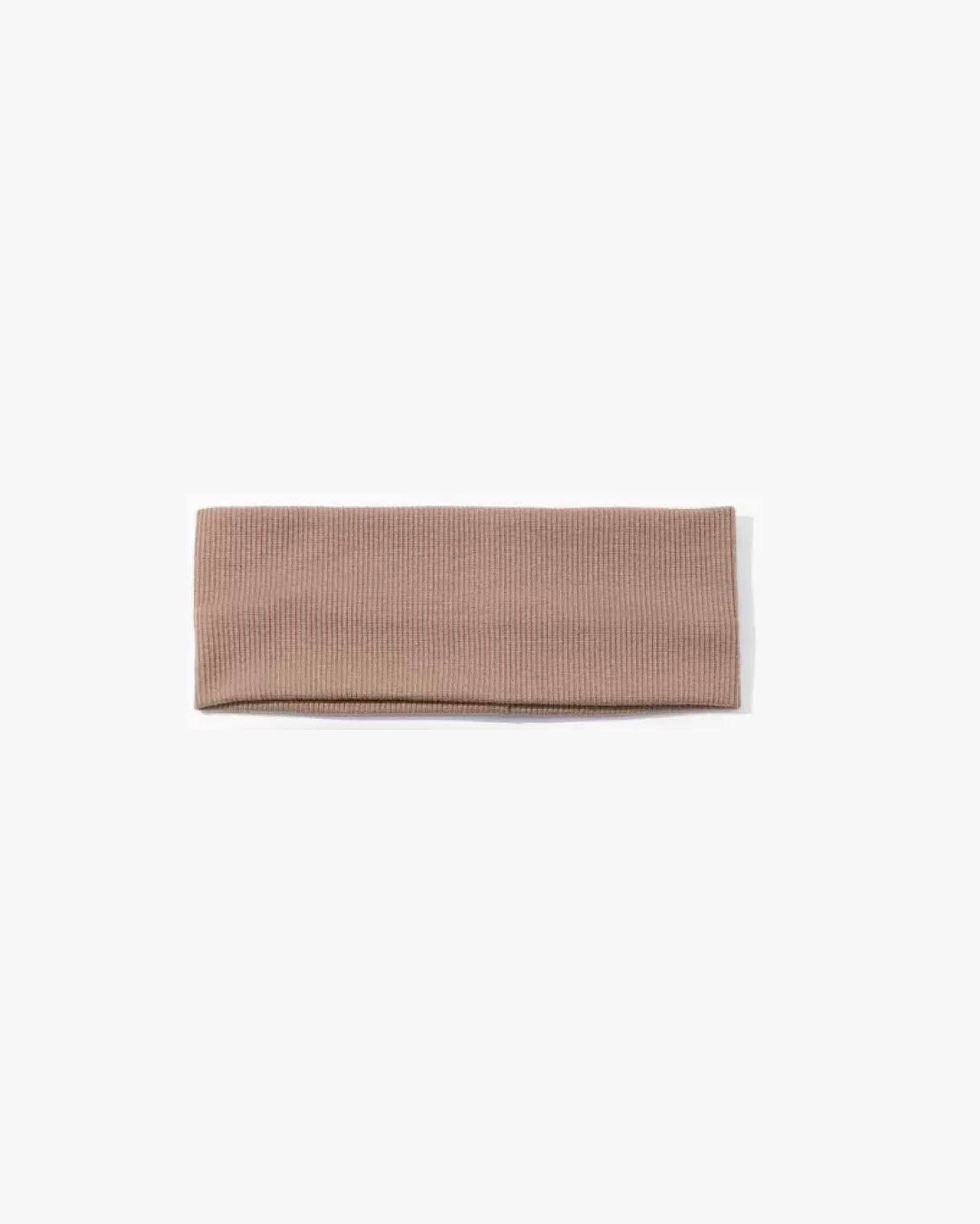 Beige headband on a white background