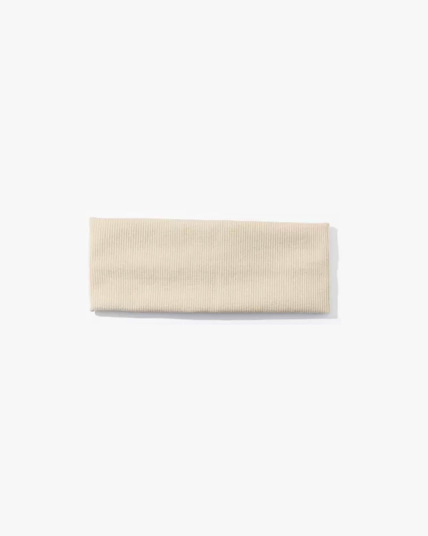 Beige rectangular tile on a white background