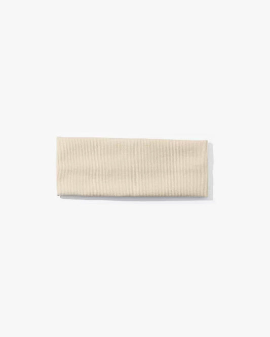 Beige rectangular tile on a white background